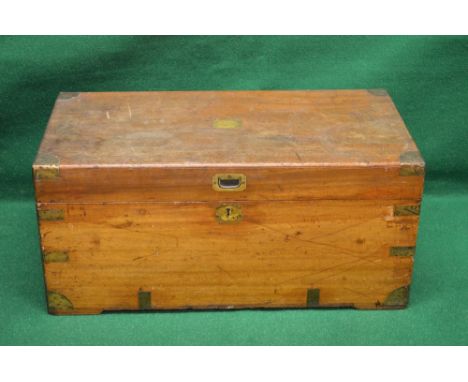 Camphor wood brass bound travelling trunk, the top opening to reveal storage space and having side carrying handles - 35" wid