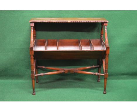 Reproduction mahogany floor standing book trough having raised shelf over book trough with five pierced divisions, supported 