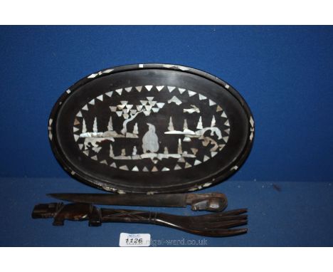 A 19th c. oval papier mache Tray inlaid with Mother of Pearl oriental scene, 11'' long, a carved wooden Knife, the handle hav