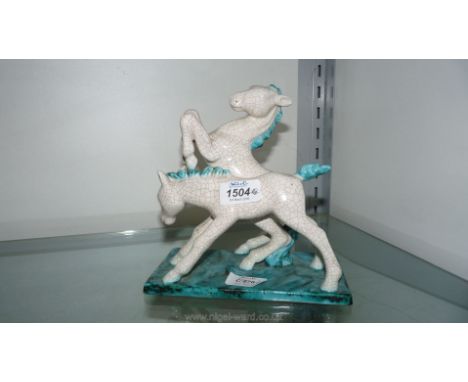 A Goldscheider Model of a pair of Playful Ponies having crackle glaze, clear mark (small chip to underside)