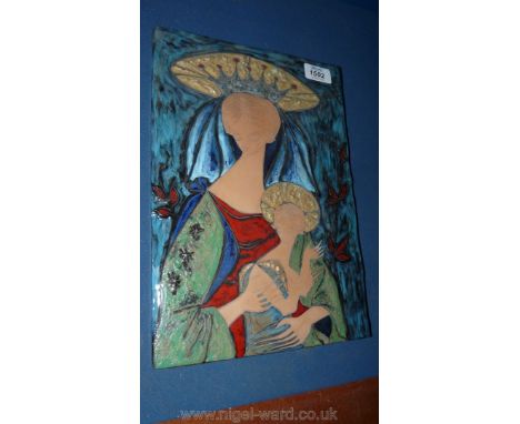 A modernist Italian ceramic Plaque of Madonna and child signed, approx 35 cms x 25 cms