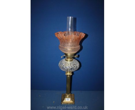 A Victorian Corninthian column Oil Lamp with cut glass font and etched pale amber crinoline shade   