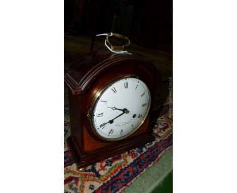 A modern Georgian style, four footed Mantle Clock with dome top and brass handle by Comitti of London