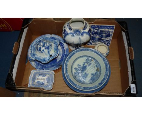 A quantity of blue and white china including Mason's lidded tureen, Delft pot, German tile, bowls, etc.