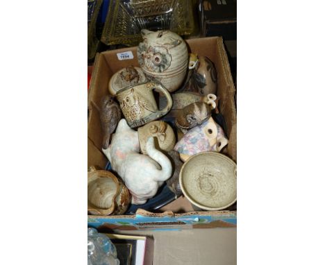 A quantity of pottery and china including Black Mountain cream jug, owl bookends, owl ornaments, two Poole pottery bird ornam