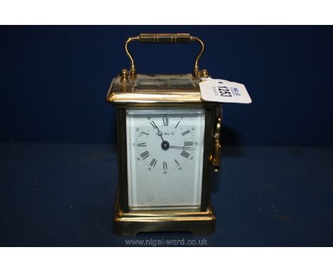 A French Brass cased modern Carriage Clock with presentation plate