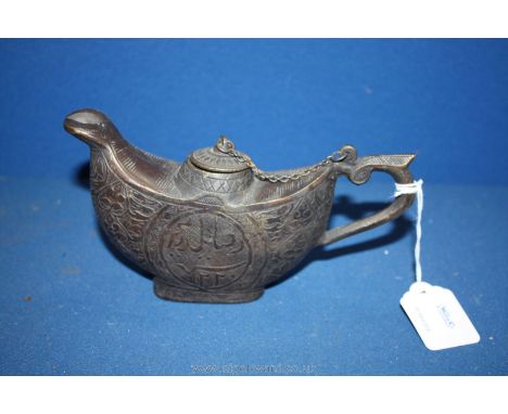 An Islamic bronze Oil Lamp