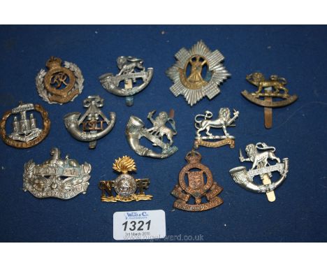 A Collection of Military Cap Badges Inc. Herefordshire and Gloucestershire Regiments, Royal Engineers, Royal Army Ordinance C
