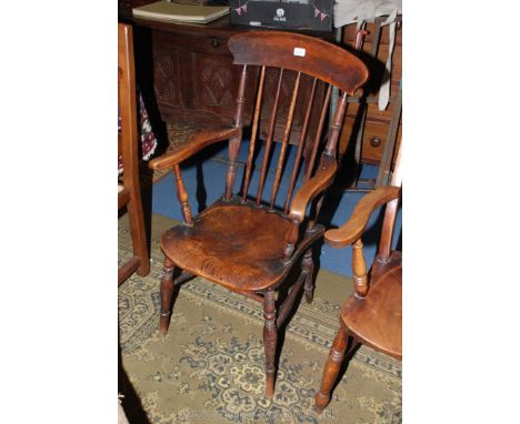 A 19th c. Oak and Elm Stick back Grandfather Chair, swept arms on turned supports, shaped Elm seat, on turned legs