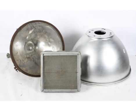 A Simplex industial spotlight, diameter 40cm, together with a similar example with a square light, diameter 25.5cm, two metal