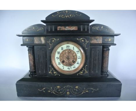A Victorian black slate and polished marble mantle clock in the classical style with 8 day striking movement