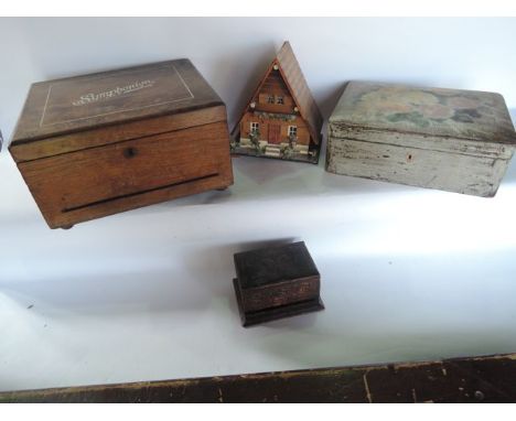 A vintage timber box with inlaid detail to top reading Symphonion, a cigarette box with hinged lid and tooled leather exterio