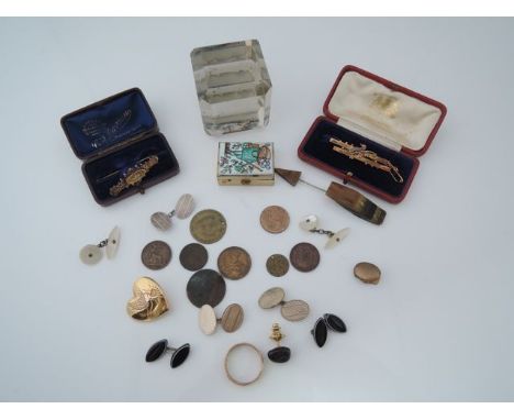 A Victorian bar brooch, highlighted with a seed pearl set floral motif, in 9ct gold, 3.2g; a Victorian bar brooch, centred wi