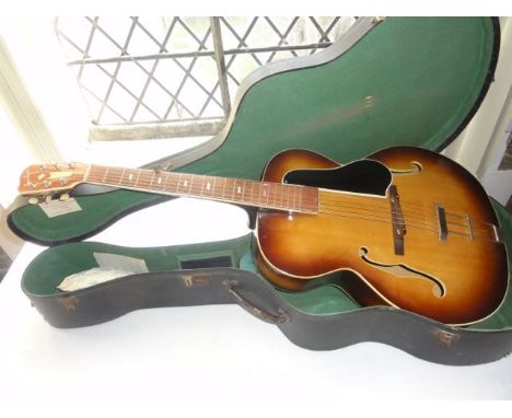 A vintage acoustic guitar marked Grimshaw, with mother-of-pearl inlaid detail to bridge, etc