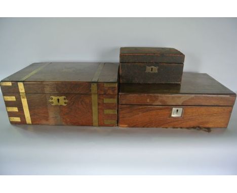 A Victorian rosewood veneered writing box with brass banded exterior detail and sloped interior, a further 19th century rosew