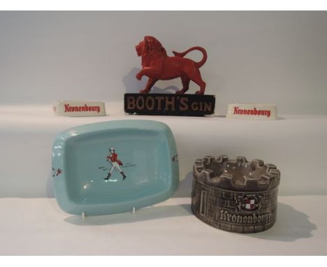 A collection of pub advertising wares including Booth's Gin model of a red lion raised on a rectangular base, a Kronenberg as