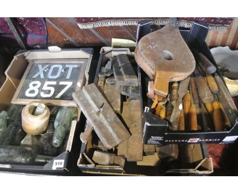 An extensive miscellaneous collection to include numerous vintage carpenter's planes, woodworking chisels, vintage glass bott