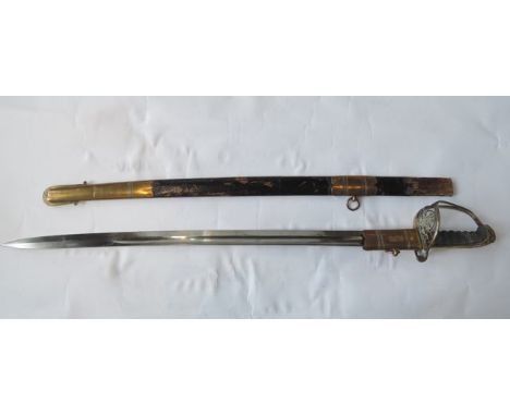 A Victorian Infantry Officers Sword 1822/45 pattern with brass mounts and fish skin grips, leather and brass mounted scabbard