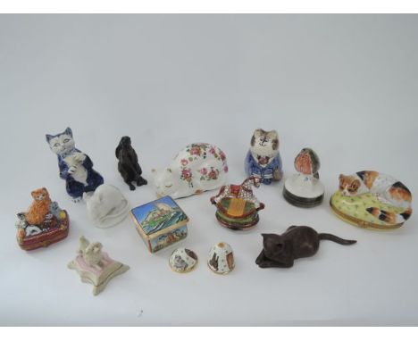 A collection of cat related decorative items including Limoges Bonboniere with ginger cat and kittens to lid, a Halcyon Days 