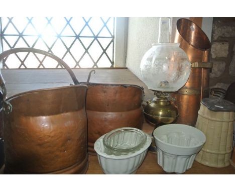 A miscellaneous collection to include a substantial copper coal hod with rounded brass detail, two further copper coal scuttl