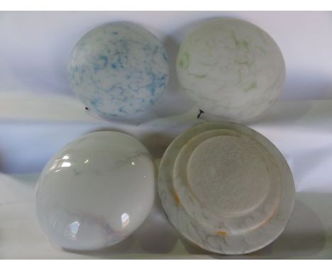 An Art Deco period marbled glass ceiling shade with abstract detail, together with three others (4)