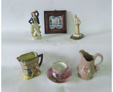 A Royal Doulton jug with relief moulded and painted decoration from the Dickens Series showing The Artful Dodger, Oliver and 