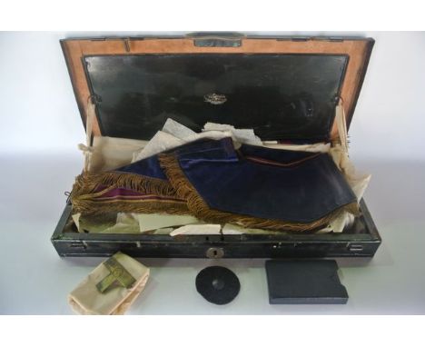 A collection of masonic effects relating to Indian lodges, to include a tin case containing a leather sash, an associated apr