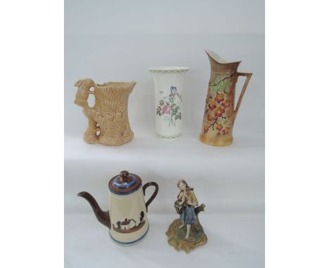 A Royal Art Pottery jug in the Art Deco manner with moulded and painted floral decoration angular handle, a Sylvac buff glaze