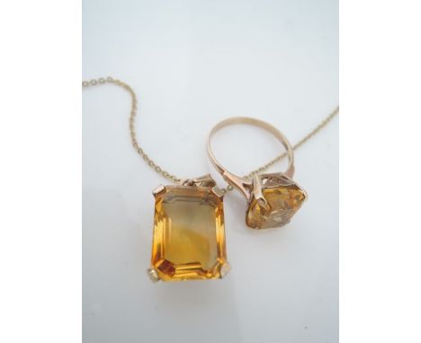 A gem-set ring, set with an emerald-cut untested citrine weighing approximately 4.46cts, in 14ct gold, size R; and a gem-set 
