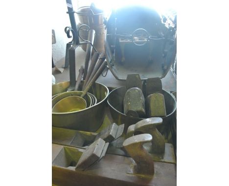 A miscellaneous collection to include four various vintage carpenters planes, a graduated set of five 19th century brass pans