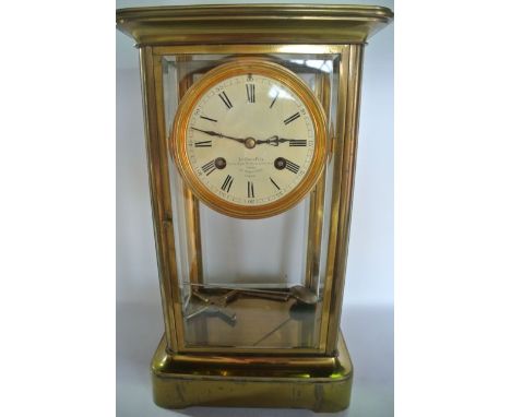 A 19th century brass four pane mantle clock, the drum movement of eight day duration with bell strike dial, labelled LeRoy & 