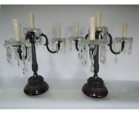 A substantial pair of contemporary electronic three divisional candelabra with scrolling supports with moulded acanthus leaf 