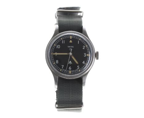 Smiths British Military Army issue stainless steel gentleman's wristwatch, circa 1969, circular black dial with Military arro