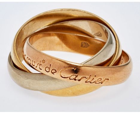 Trinity-Ring "les must de Cartier", Cartier.18 kt GG/WG/RG. 3 ineinander verschlungene Ringe jew. 1x in GG, WG u. RG. RG-Schi