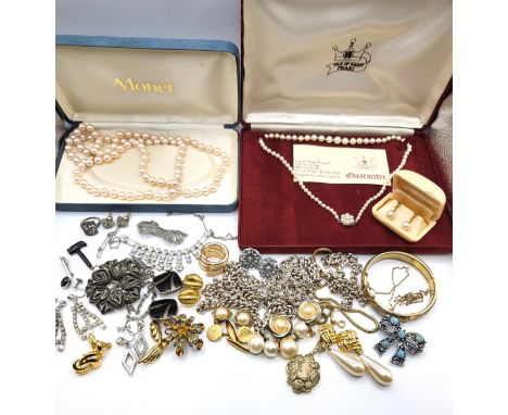 A large lot of costume jewellery including two boxed sets of faux pearls, earrings and brown cardboard box of costume mixed i
