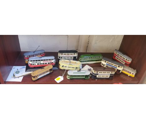 Corgi Classics trams including Metropolitan, London transport, and Glasgow Corporation, five with certificate cards. (11)