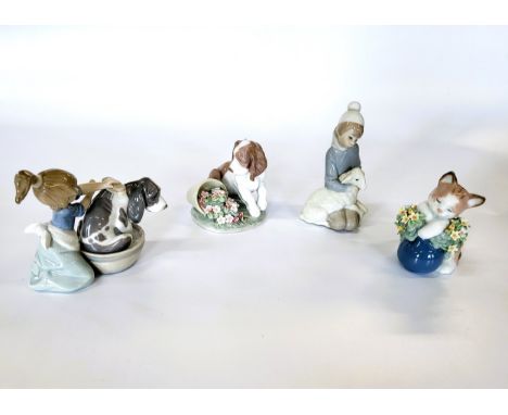 Four assorted Lladro figures including 6567, 5455, and 7672 in original boxes, and Shepherd Boy in box. (4)
