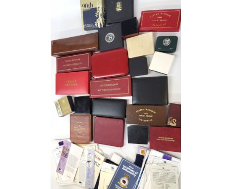 A large quantity of gold proof coin boxes (empty) from around the globe, and others.