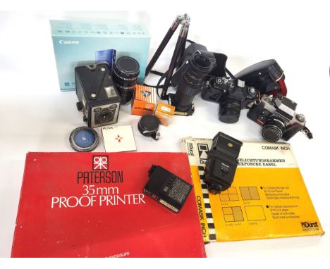 Assorted cameras including an Exakta RTL 1000 35mm cased, Zenit EM 35mm cased, Kodak Brownie Model D, Canon Ixus IS compact d