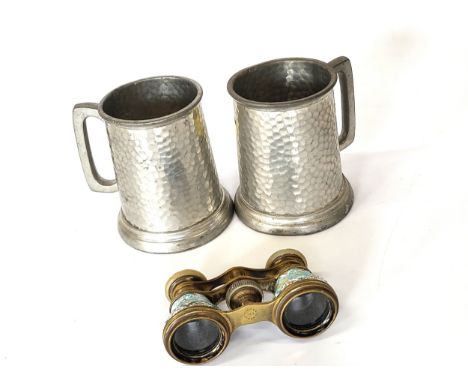 A pair of enameled and mother of pearl opera glasses with engine turned decoration and two pewter tankards. (3)