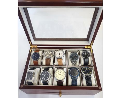 A collection of ten watches housed in a wooden travel/display case, includes Hugo Boss, Hilfiger, Lacoste, Lilienthal Berlin,