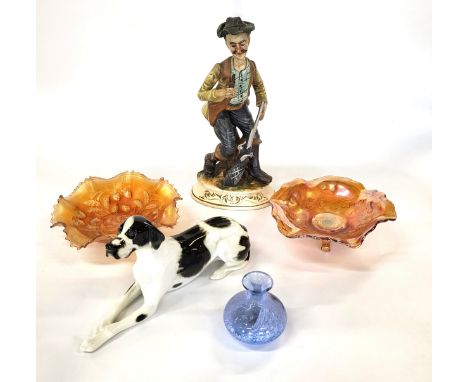 A Capodimonte figure of a hunter 34cm, Russian seated black and white dog 29cm, two carnival glass bowls both 21cm diameter, 