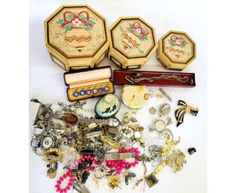Three octagonal boxes with Christmas bauble decoration containing costume jewellery including a mixture of necklaces, brooche