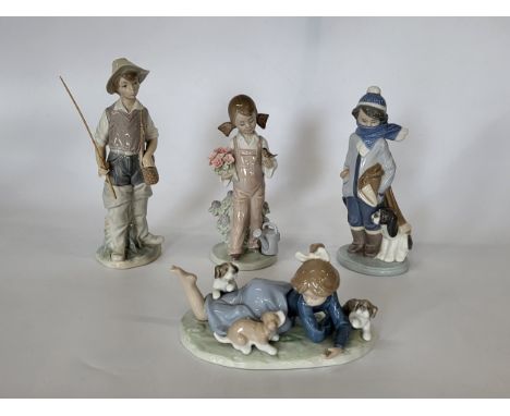 Four Lladro figures including 5594, 5217, 5220, and 4809 (fingers on left hand missing). In original boxes. (4)