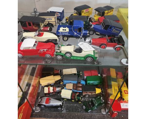 Matchbox Models of Yesteryear including Taystee, Suze, and Menier Vans, Mercedes-Benz 540K, and Prince Henry Vauxhall. (25)