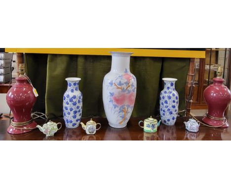 A pair of Oriental porcelain blue and white leaf pattern vases 26cm, vase with floral decoration 40cm, pair of lamp bases wit