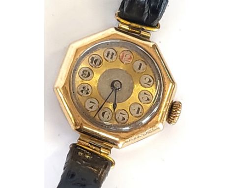 A 9ct gold ladies octagonal watch from the 1930's.