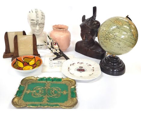An eclectic mix including a globe, two wooden photo frames, phrenology head, a Balinese bust, Swarovski dog, Poole dish, a pa