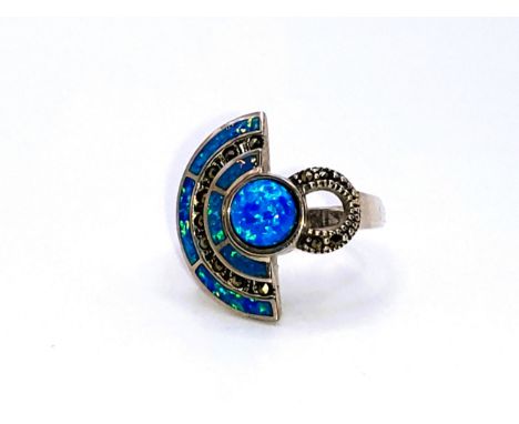 A silver (925) opal and marcasite Art Deco style dress ring. 6.2gms size P.