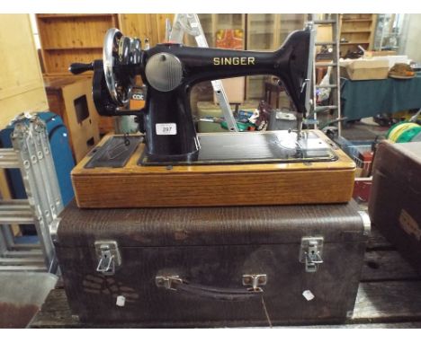 A Vintage Singer Sewing Machine In Original Box with Accessories and Tools